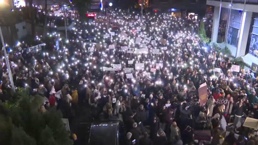 Students disrupt news on state TV